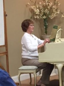 Woman playing piano.