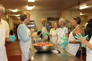 Church members on the Meals on Wheels food preparation line.